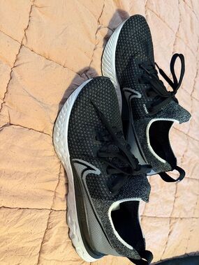 Nike Black and White Knit Slip-On Sneakers